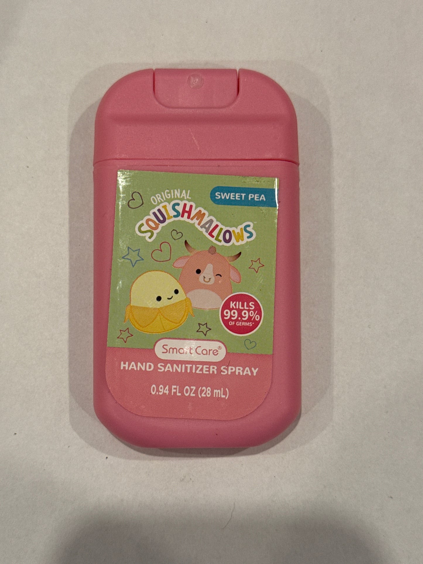Squish pink hand sanitizer