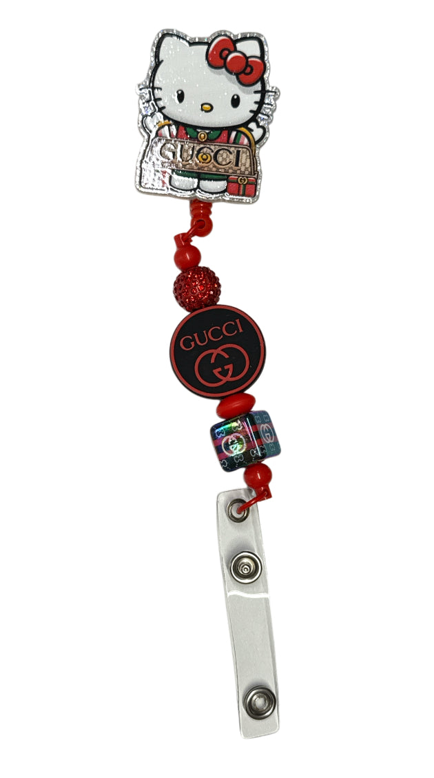 Hello kitty Gucci badge reel