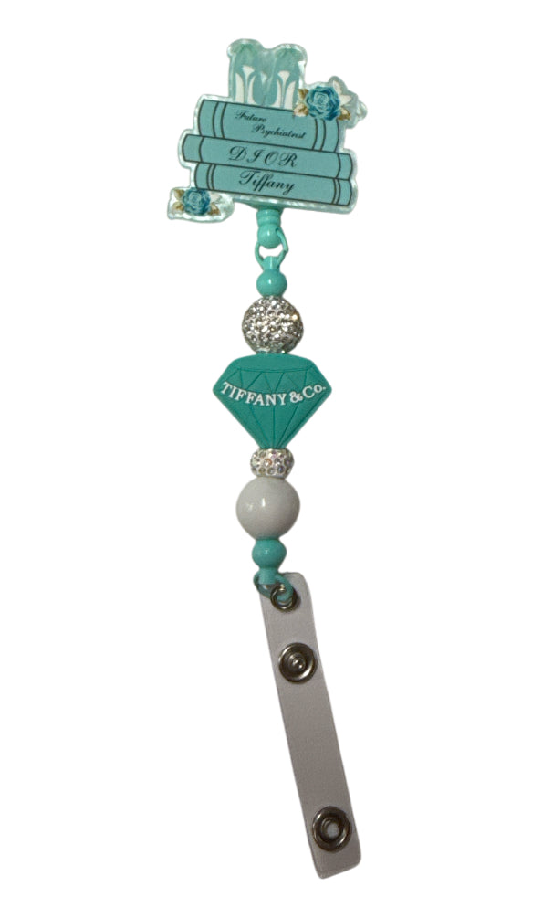 Tiffany & co heels beaded badge reel