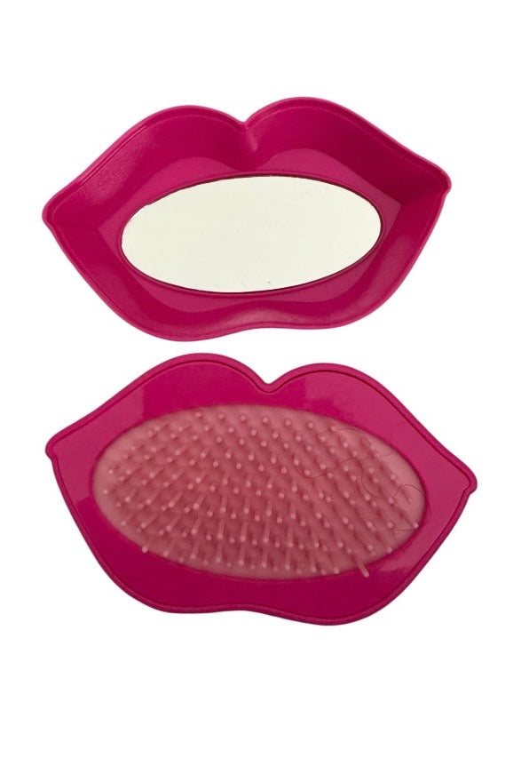 Pink lips brush and mirror