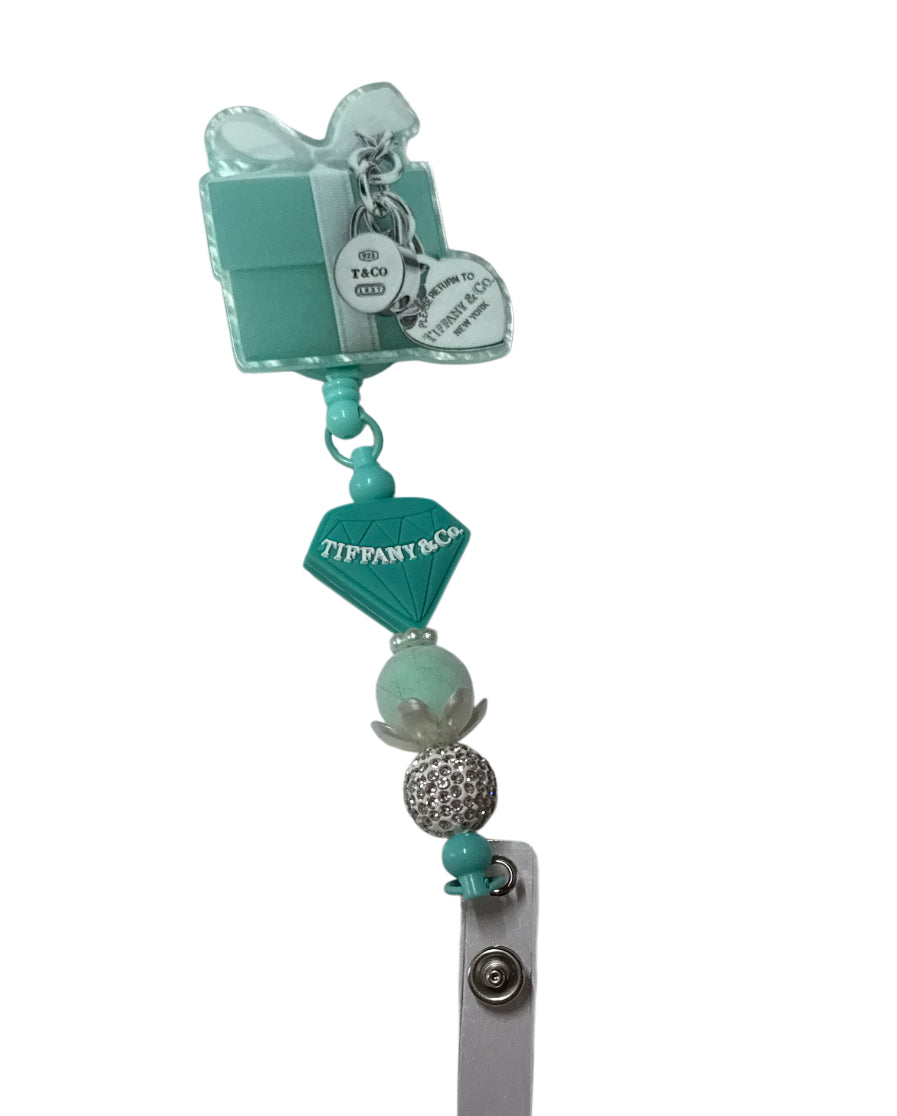 Tiffany & co box beaded badge reel