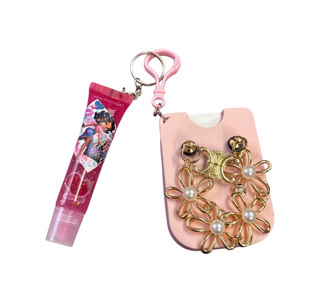 hand sanitizer with case charms and random lip gloss