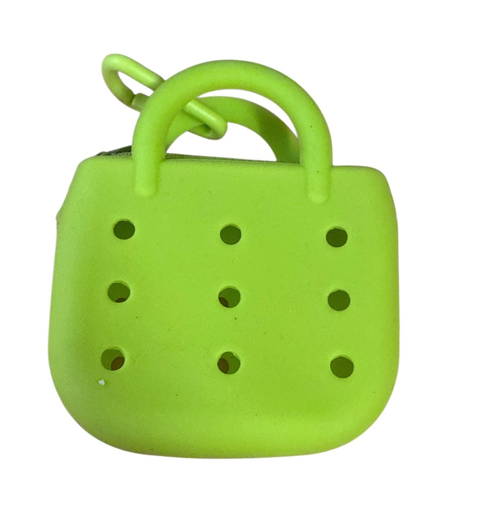 Small rubber charm purse with 3 free mystery charms