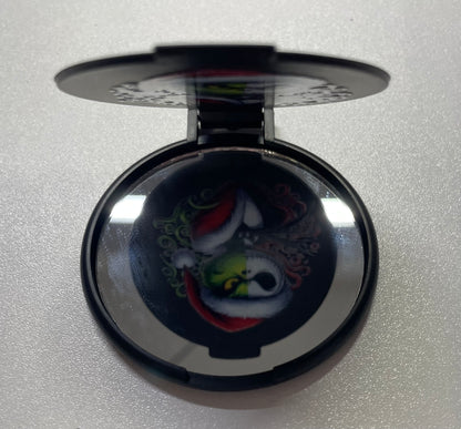 Half jack half grinch pocket mirror