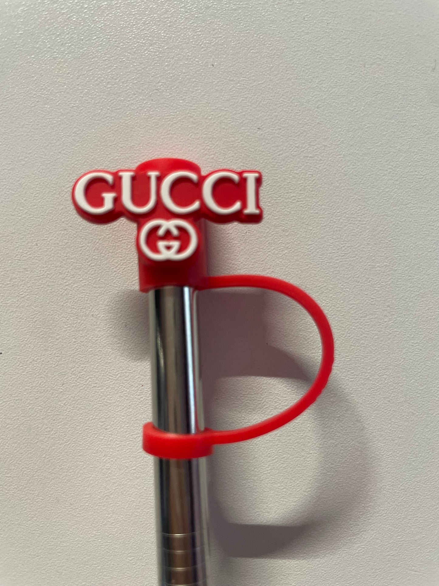 Gucci red sign under Straw Topper